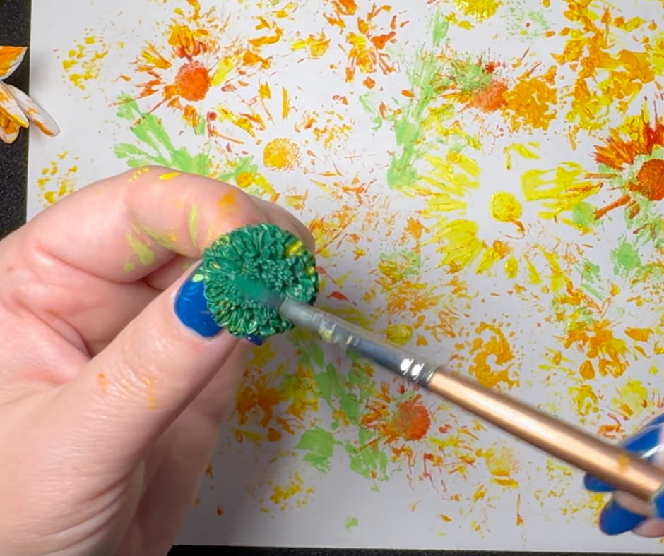 Ms. Jes showing a fun art project for homeschoolers.